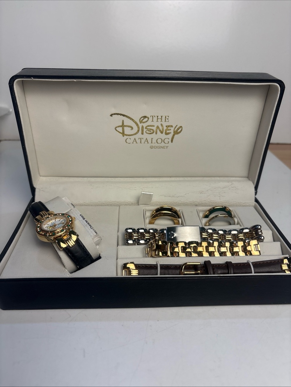 Disney Tinker Bell Gold-Tone Watch set with interchangeable bands and frames.